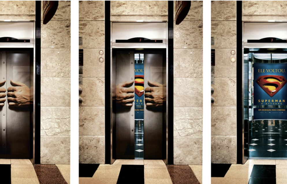 mídia em elevador Superman